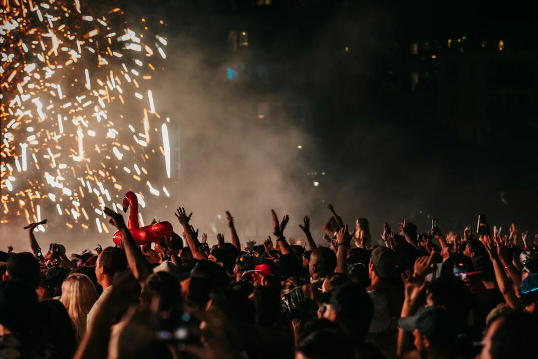 Crowd with hands up at a music festival