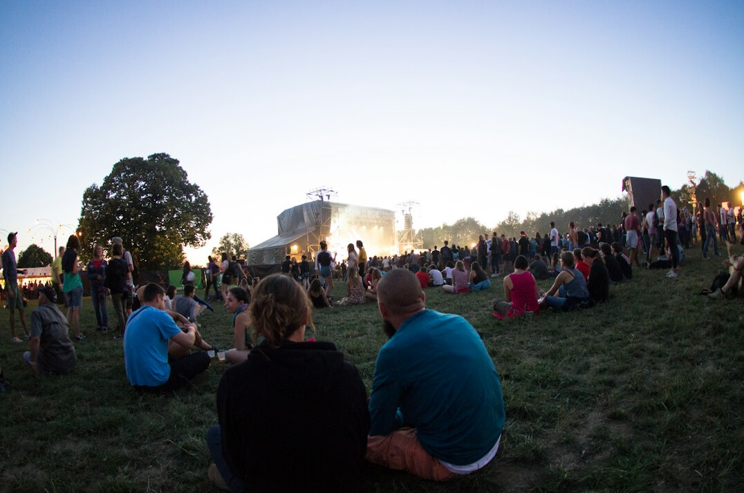 Music festival stage at dusk