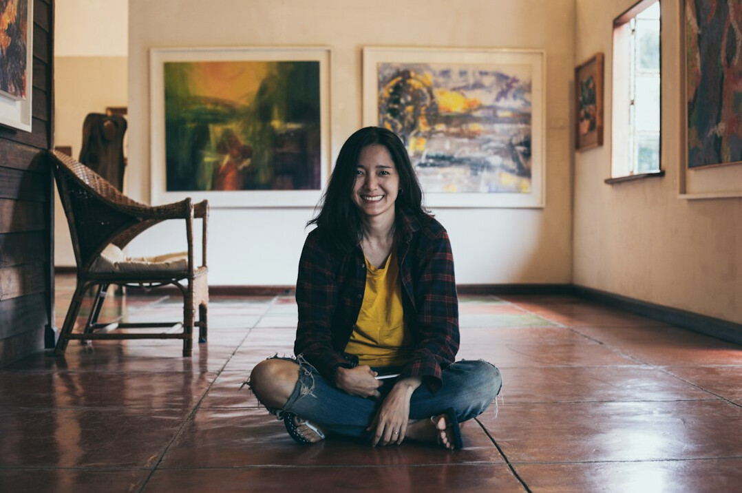 Portrait of a smiling woman editor