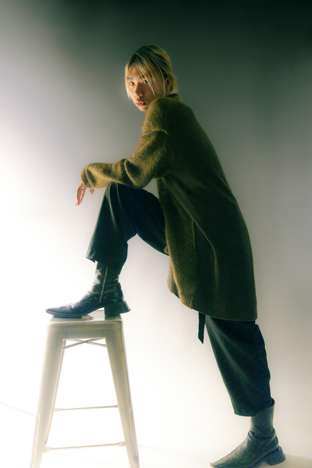 Fashion editorial portrait of a woman in stylish clothing