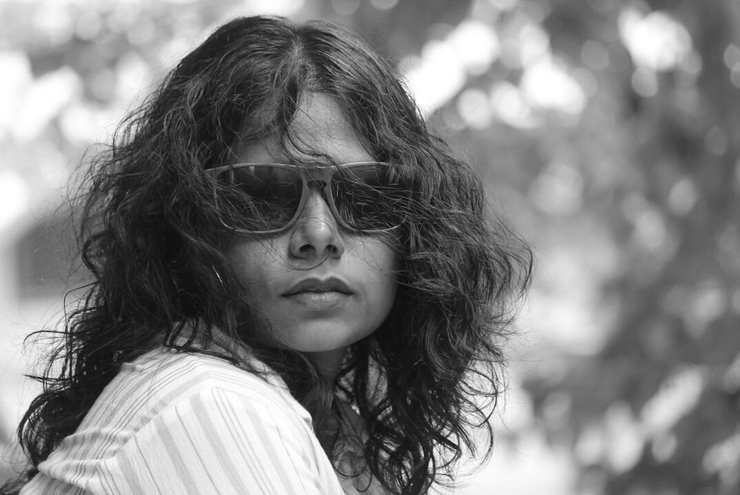 Portrait of a woman with curly hair